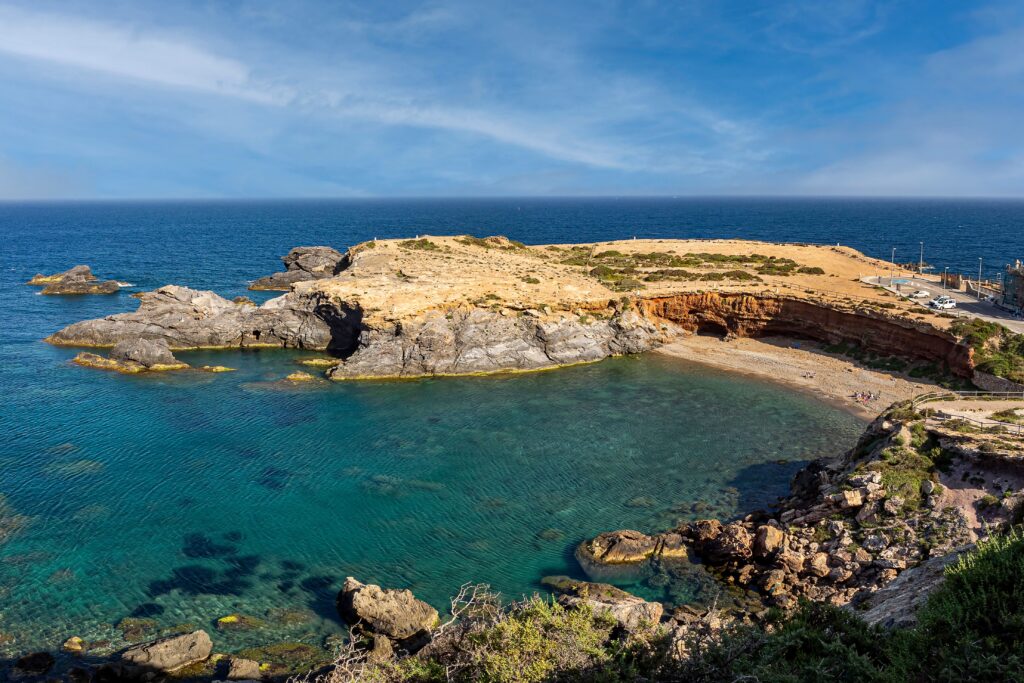 Tabarca Island near Alicante, showing the historic walled village surrounded by turquoise Mediterranean waters.