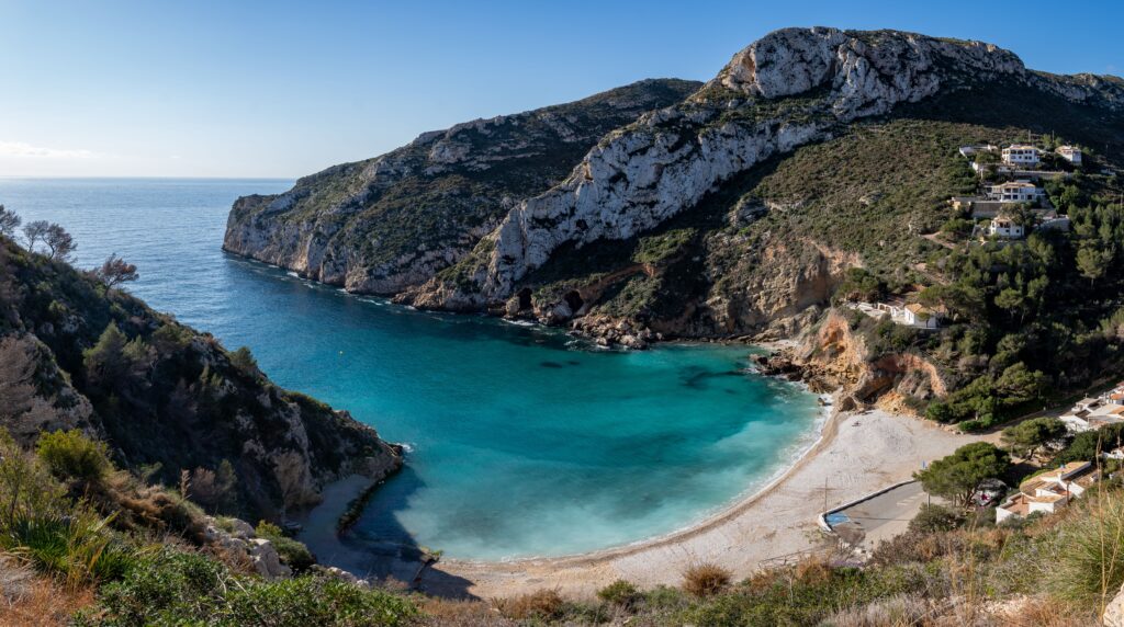 Hidden gems in Alicante, turquoise Mediterranean coves and rugged coastline at Cabo de la Huerta.